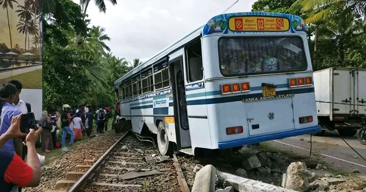A Private Bus Crashed Onto Railway Line